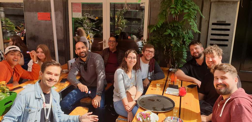 Guests sharing food at an Amsterdam terrace